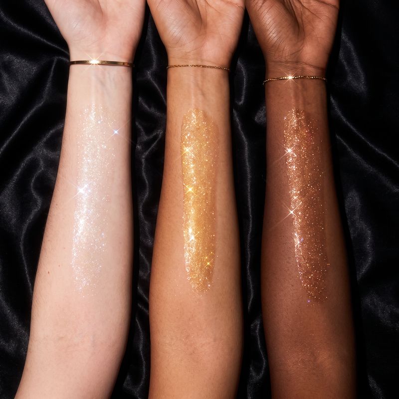 Ivory Pearl, Molten Gold and Deep Bronze swatched on fair, medium and deep forearms